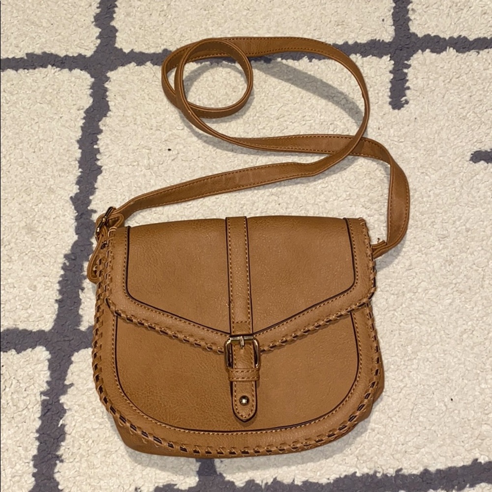 Never used cross body bag/purse light brown color